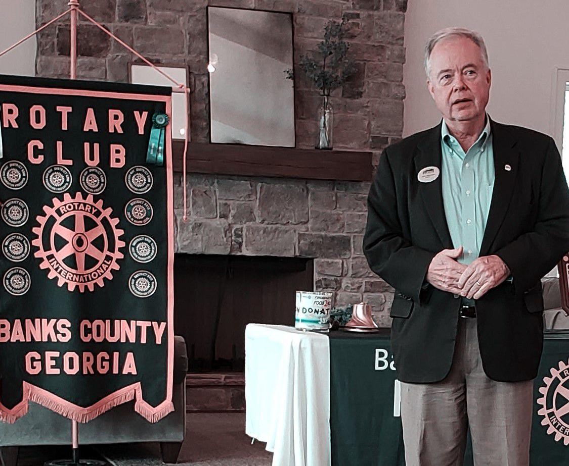 WILKINSON SPEAKS AT ROTARY